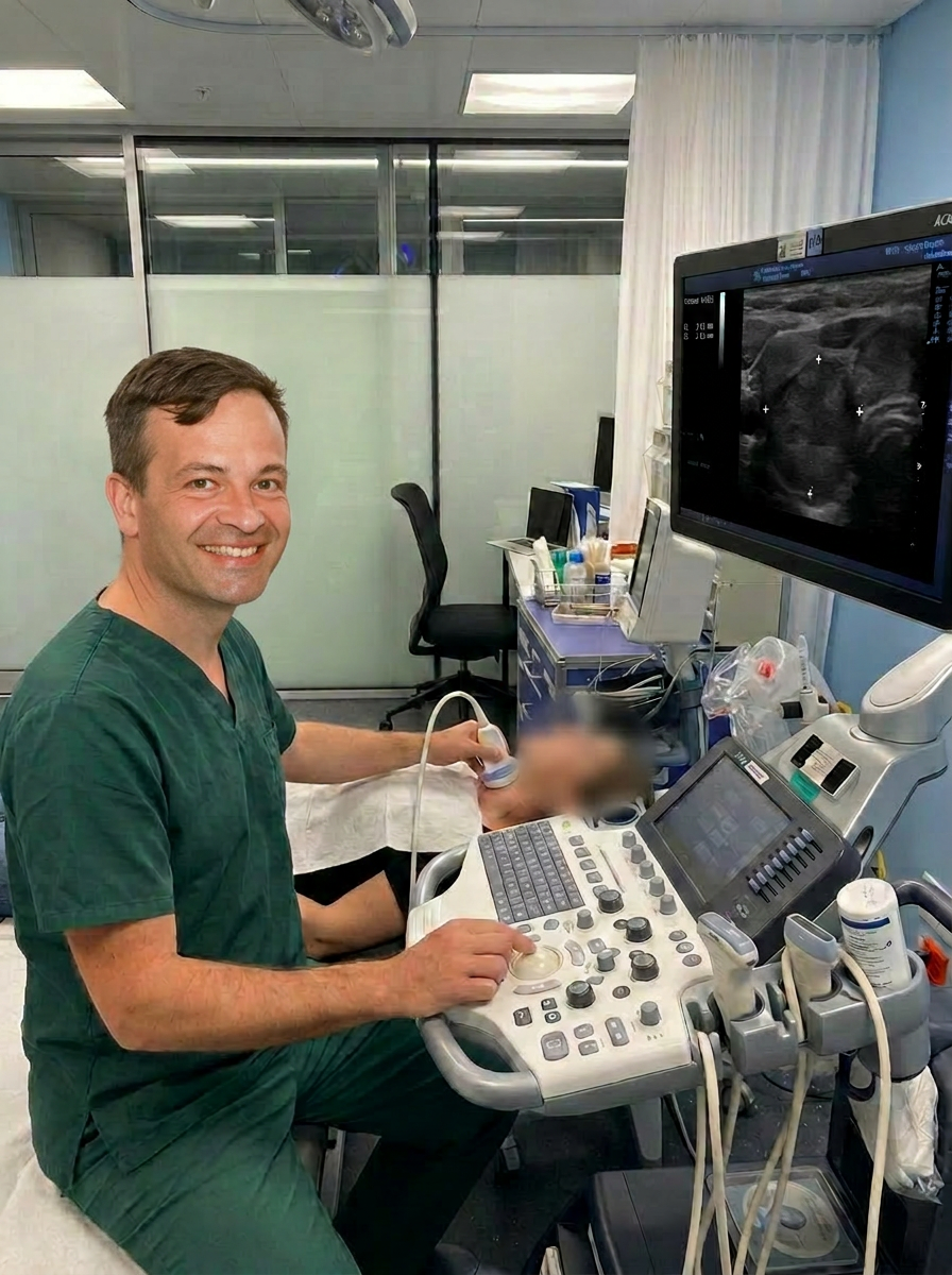 Dr. Schneider performing an ultrasound-guided thyroid radiofrequency ablation